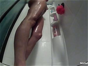 Nikita takes a mind-blowing shower